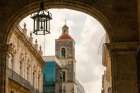Cuba, Havana. Looking out through archways from the Plaza de Armas. Unesco World Heritage Site. Art Print
